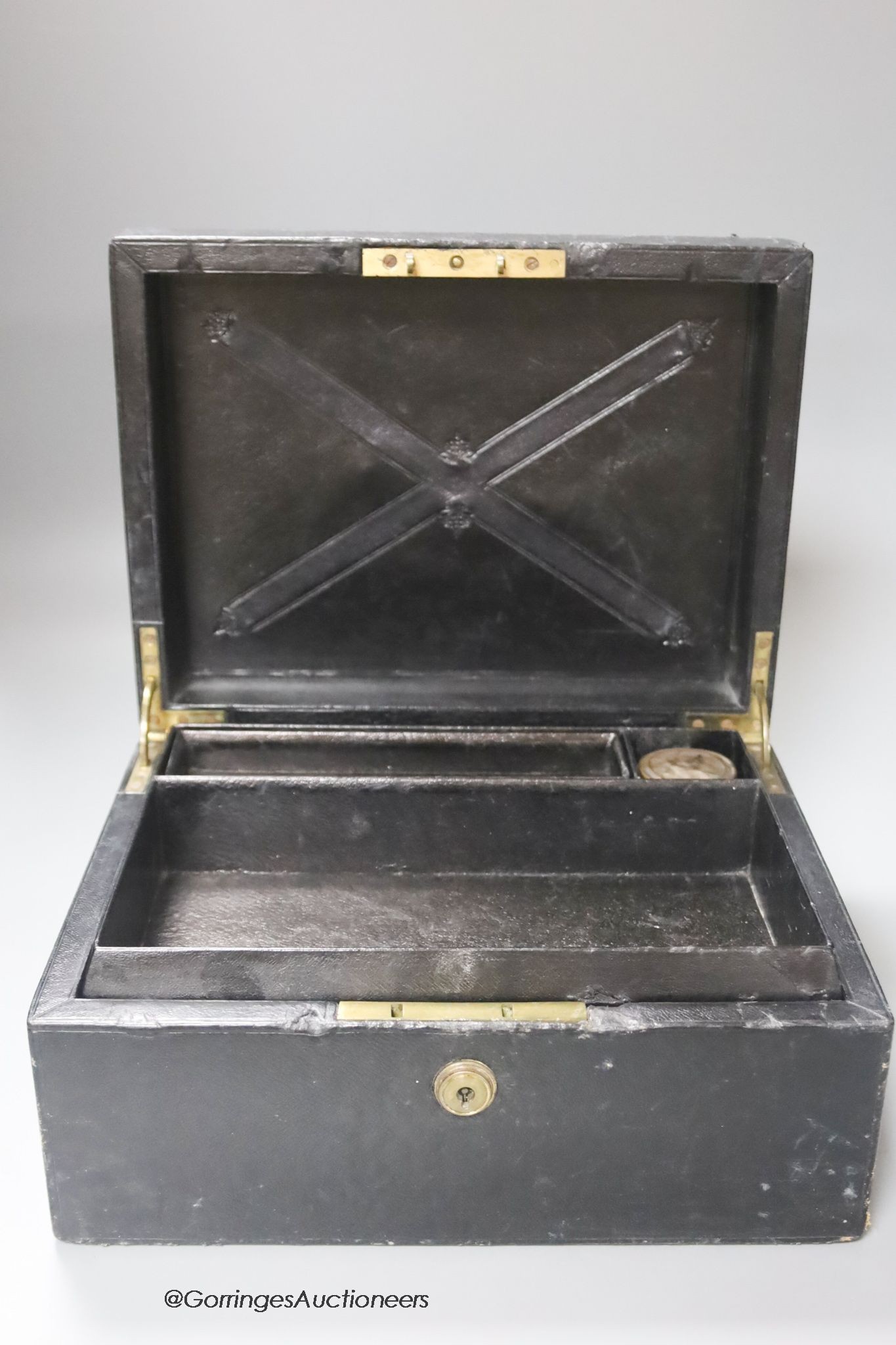 A Victorian leather bound writing box, length 27cm